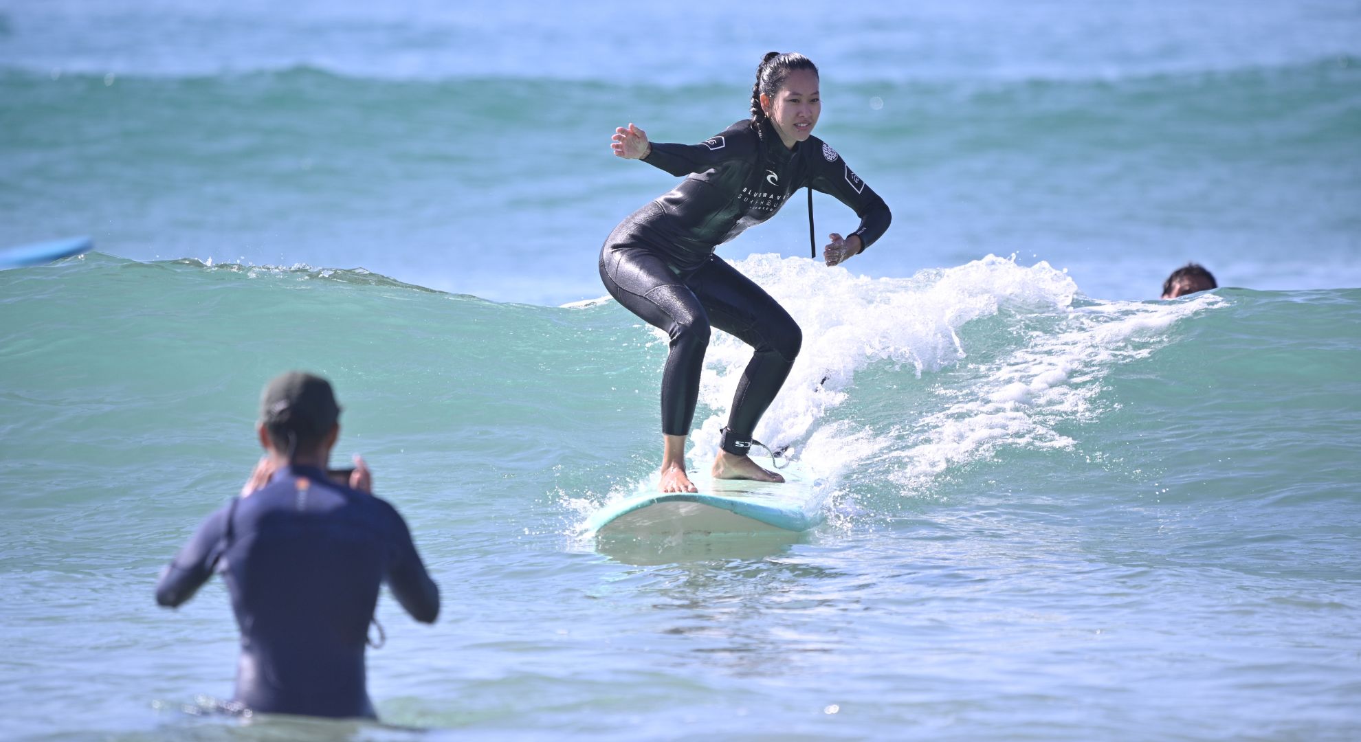 Video analysis session with surf coaches